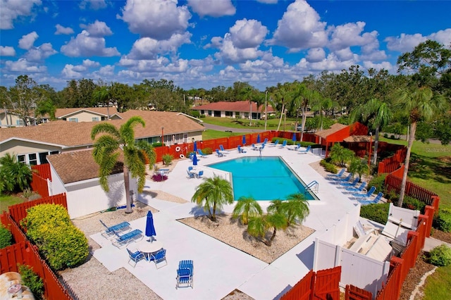 view of swimming pool with a patio