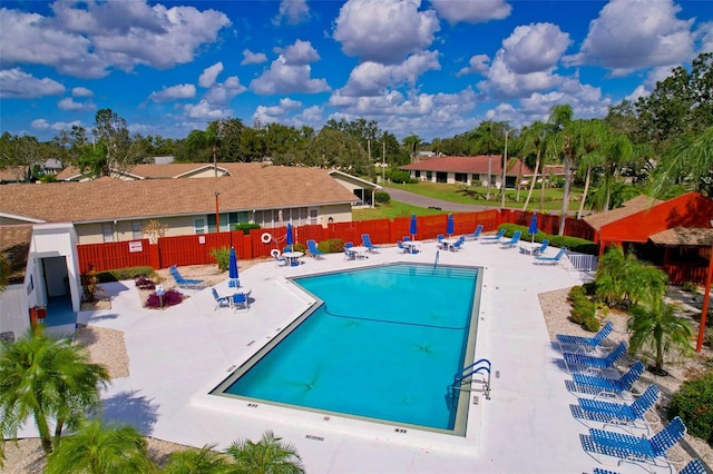 view of pool featuring a patio