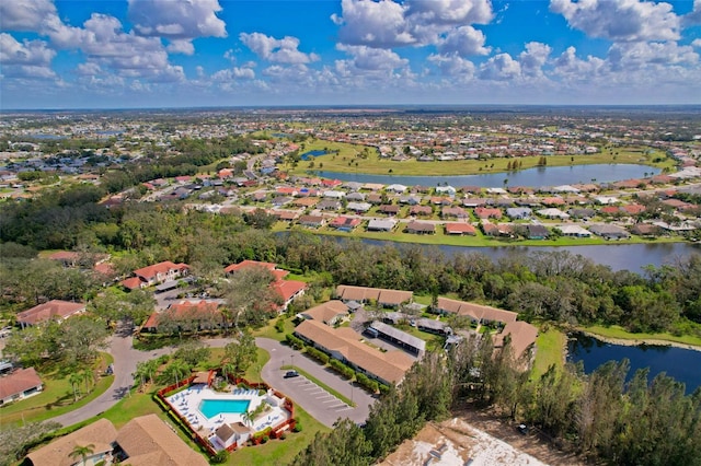 bird's eye view with a water view