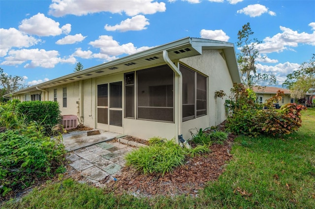 back of house featuring a patio area