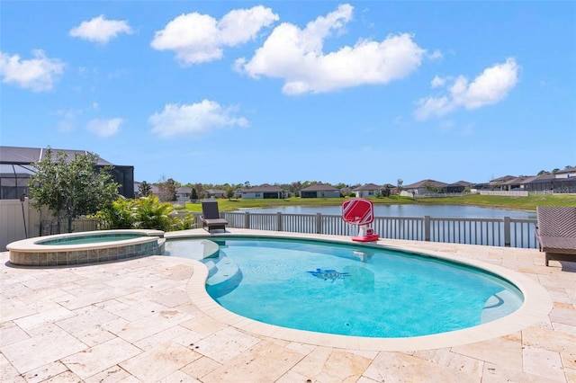 view of pool with a residential view, a pool with connected hot tub, a water view, and a patio