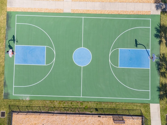 view of sport court featuring community basketball court and fence