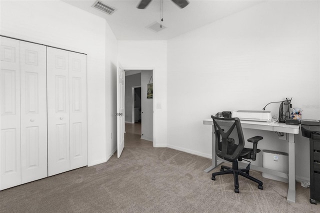 office space featuring ceiling fan, carpet floors, visible vents, and baseboards