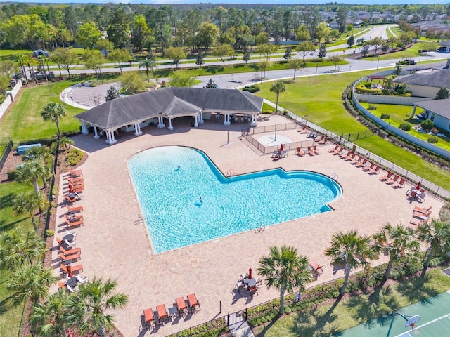 community pool featuring a patio area, fence, and a gazebo