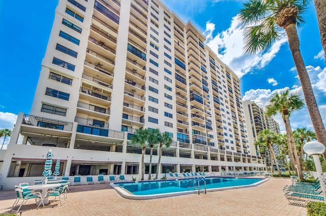 view of swimming pool with a patio