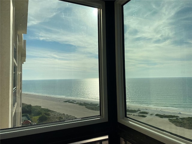 property view of water featuring a beach view