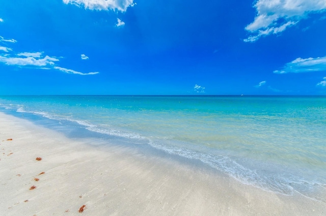 property view of water featuring a view of the beach