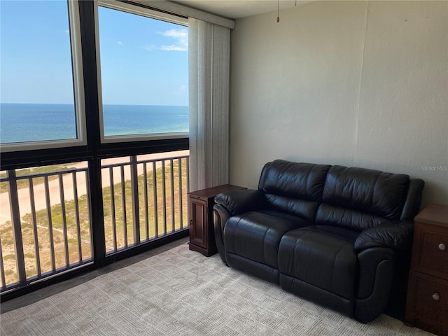 living room featuring a water view