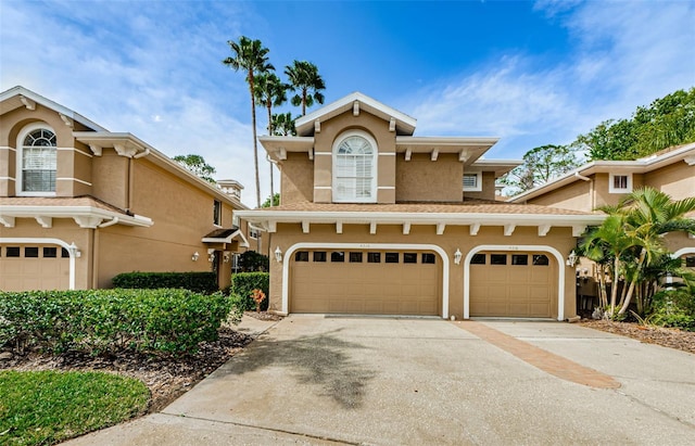 view of front of property with a garage