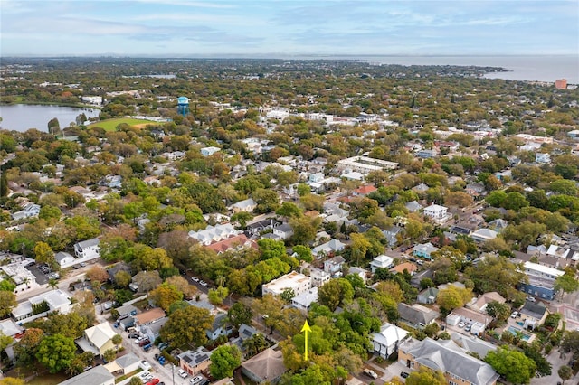 drone / aerial view with a water view