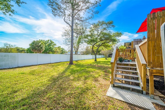 view of yard with a deck