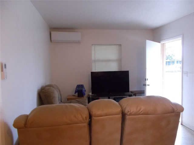 living room with a wall mounted air conditioner