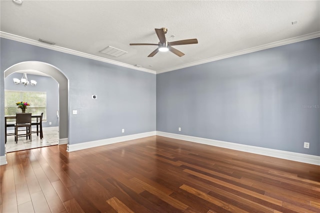 unfurnished room with ceiling fan with notable chandelier, dark hardwood / wood-style floors, a textured ceiling, and ornamental molding