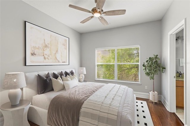 bedroom with ceiling fan and dark wood-type flooring