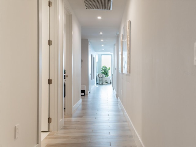 hall featuring light wood-type flooring