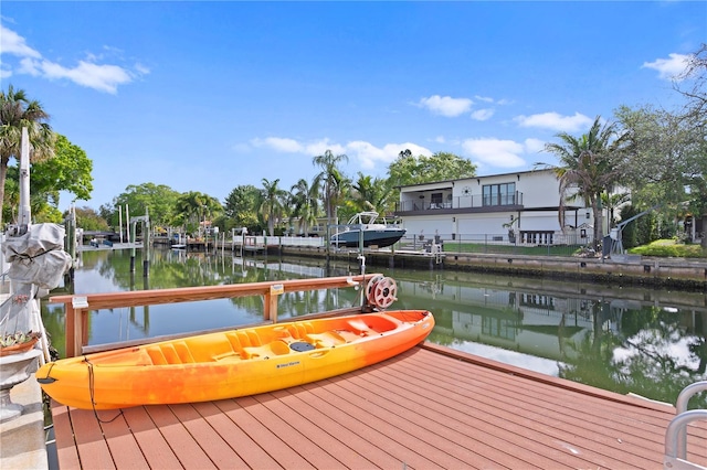 dock area with a water view