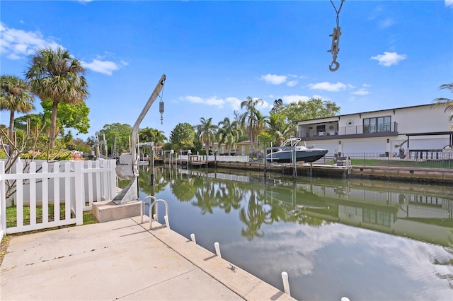 dock area with a water view