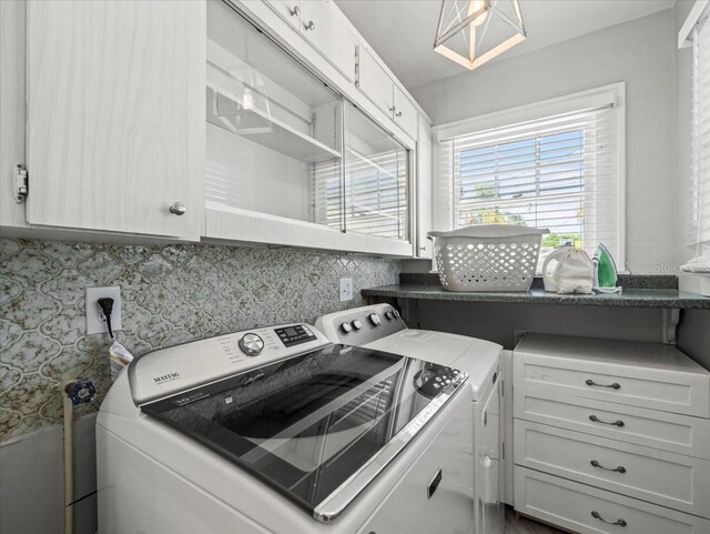 laundry area with cabinets and washer and dryer