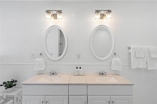 bathroom featuring dual vanity