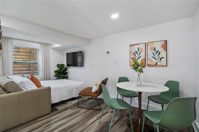 bedroom featuring dark hardwood / wood-style floors