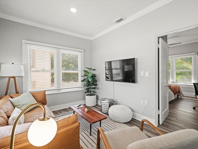 living room with ornamental molding and wood-type flooring