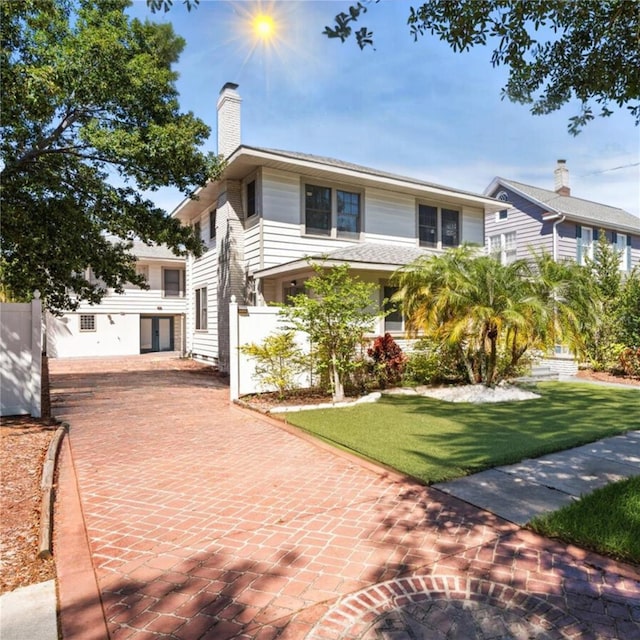 view of front of house with a front lawn