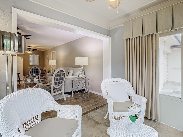 bedroom with white fridge and ceiling fan