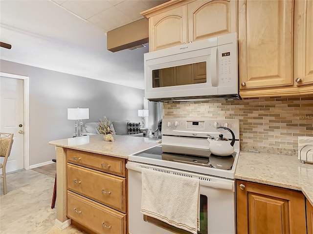 kitchen with backsplash, white appliances, light tile floors, light stone counters, and light brown cabinetry