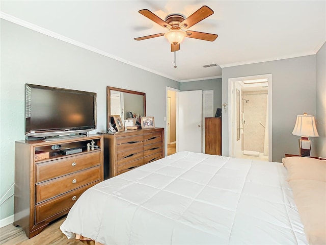 bedroom with light hardwood / wood-style flooring, connected bathroom, ceiling fan, and crown molding