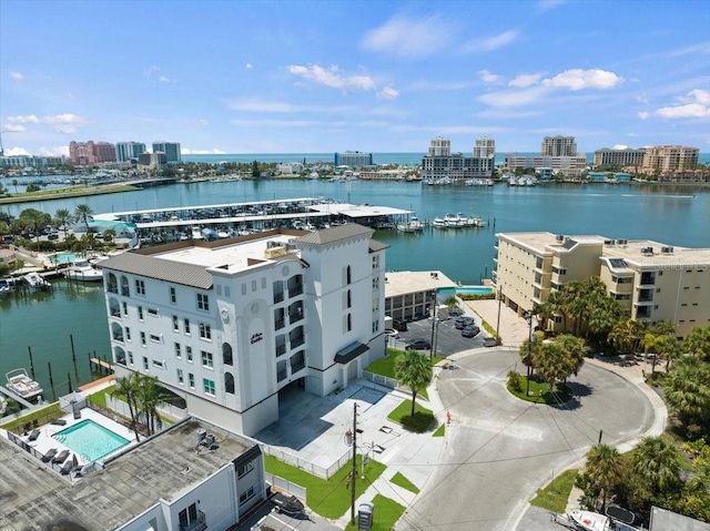 birds eye view of property with a water view