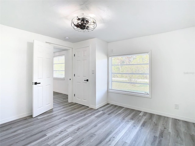 unfurnished bedroom featuring light hardwood / wood-style floors