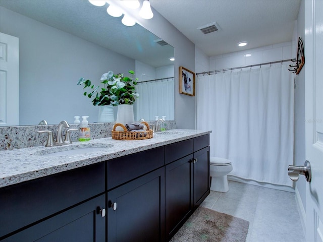 full bathroom featuring vanity, toilet, and shower / tub combo with curtain