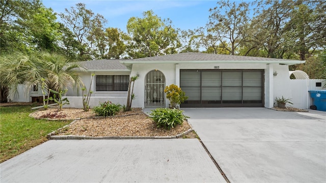 single story home featuring a garage