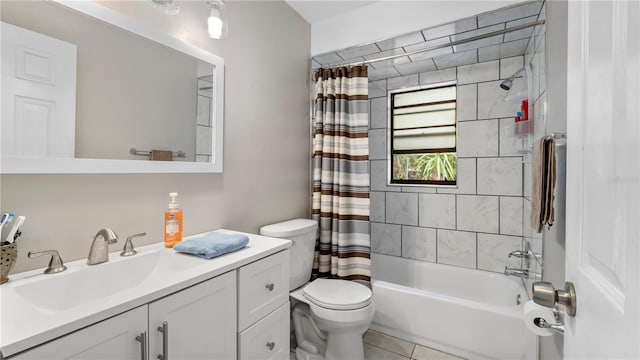 full bathroom with vanity, tile flooring, shower / tub combo with curtain, and toilet