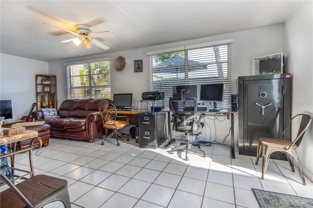 office featuring ceiling fan and light tile patterned flooring