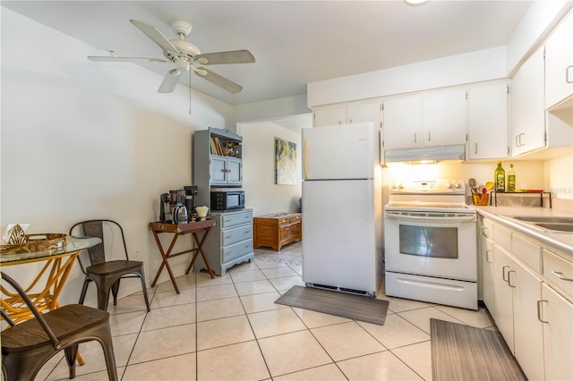 kitchen with white cabinets, ceiling fan, light tile patterned floors, sink, and white appliances