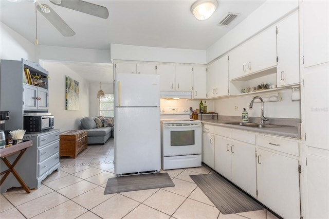 kitchen with ceiling fan, white cabinetry, light tile patterned flooring, sink, and white appliances