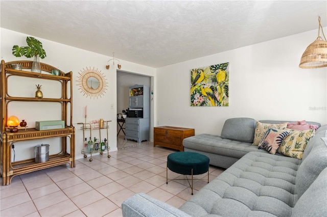 tiled living room with a textured ceiling