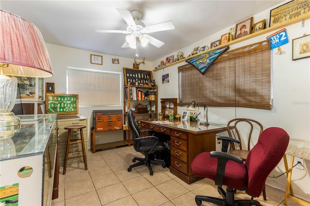 office space featuring light tile patterned floors and ceiling fan