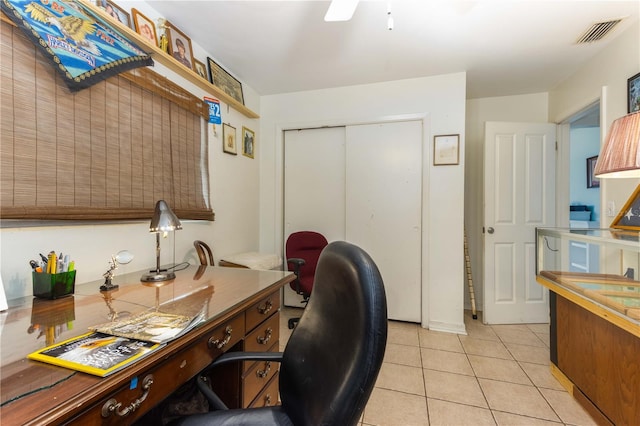 office area featuring light tile patterned flooring