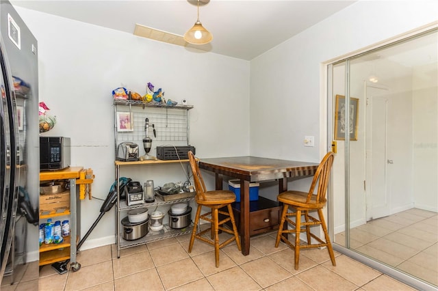 view of tiled dining area