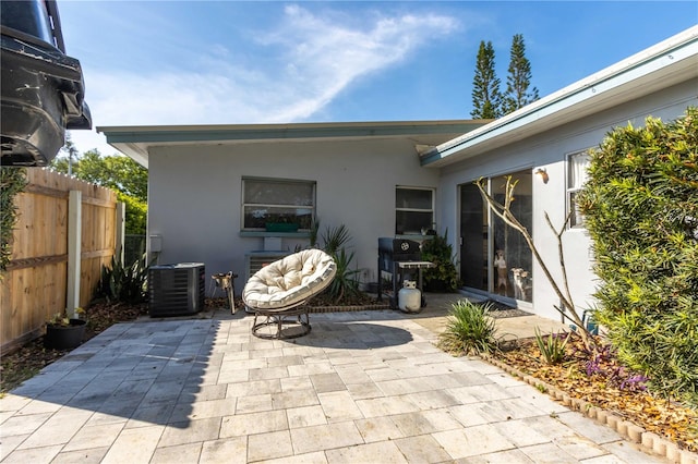 view of patio with central AC unit