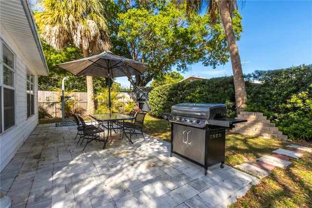 view of patio with a grill