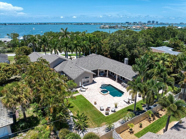 birds eye view of property featuring a water view