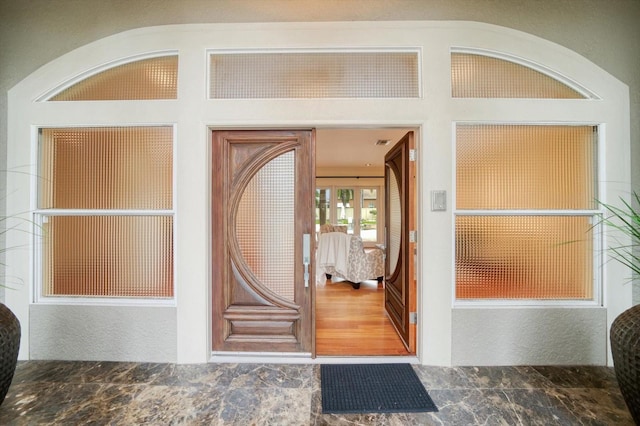 entrance to property featuring french doors