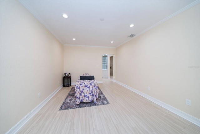 interior space with crown molding