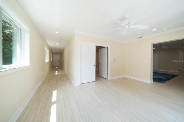 interior space with ceiling fan