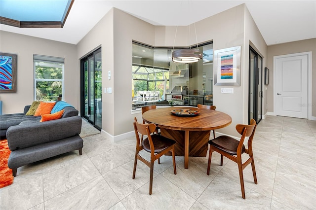 dining area with plenty of natural light