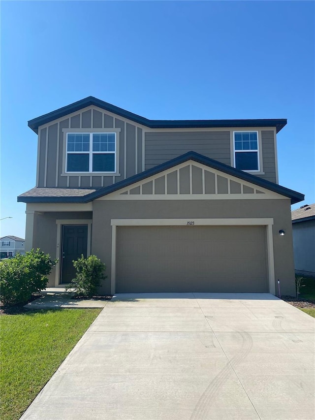 view of front of property featuring a garage