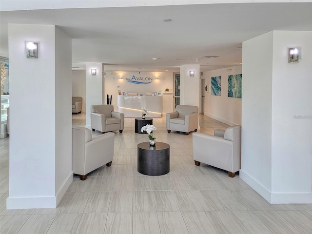 living room with light tile patterned floors